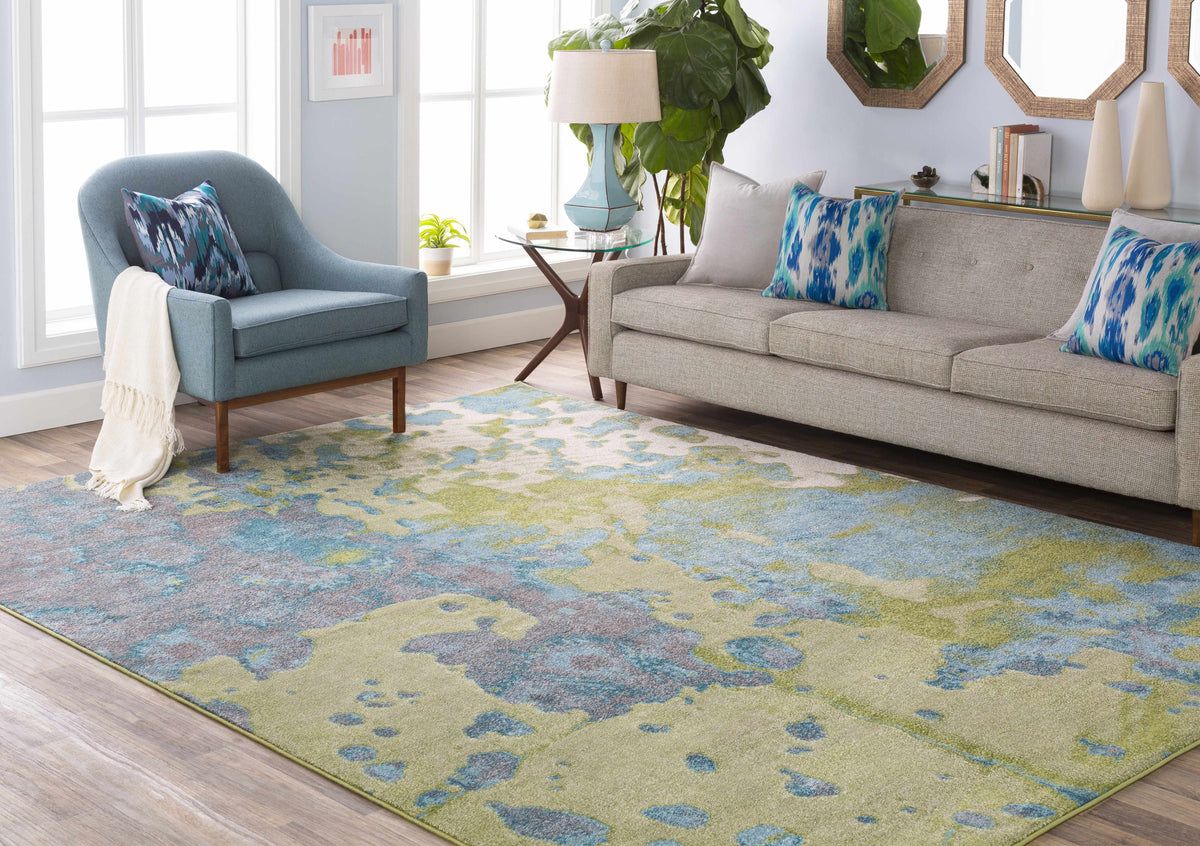 a living room with a couch and a rug
