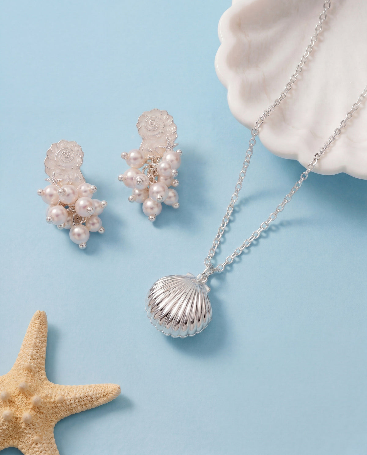 a necklace and earrings with pearls