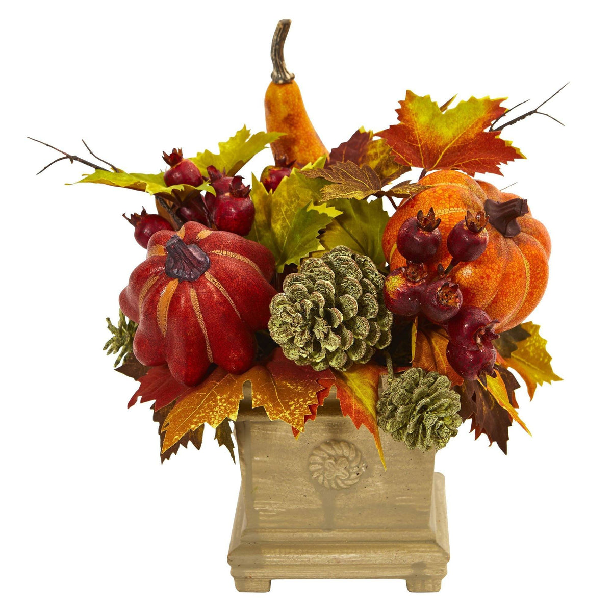 a vase with fake fruits and leaves