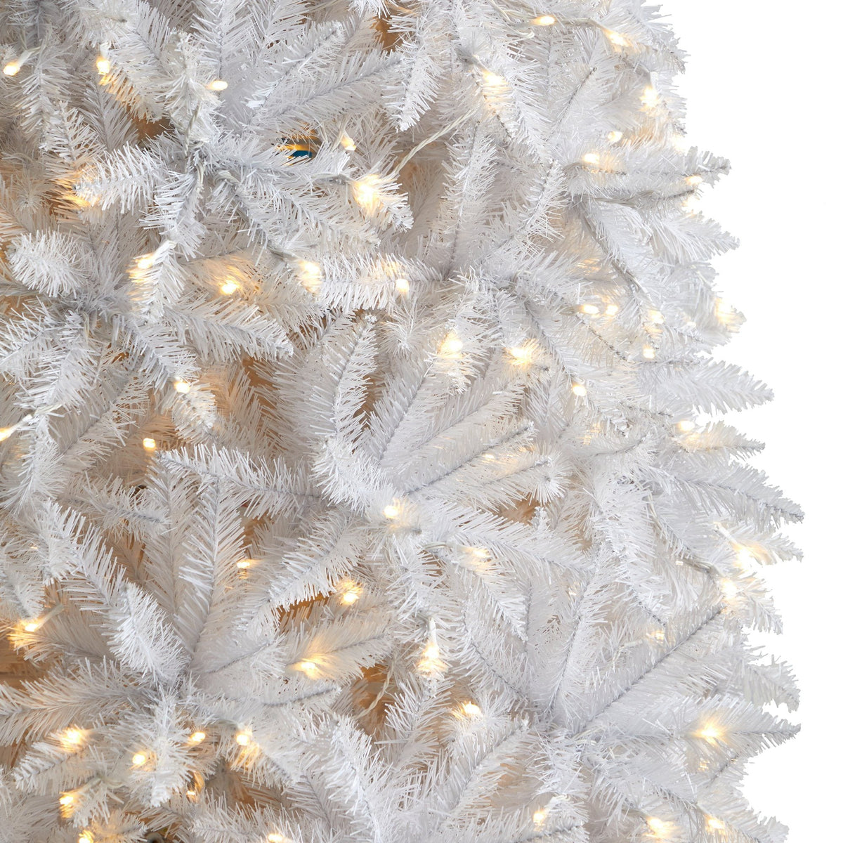 a close up of a white christmas tree