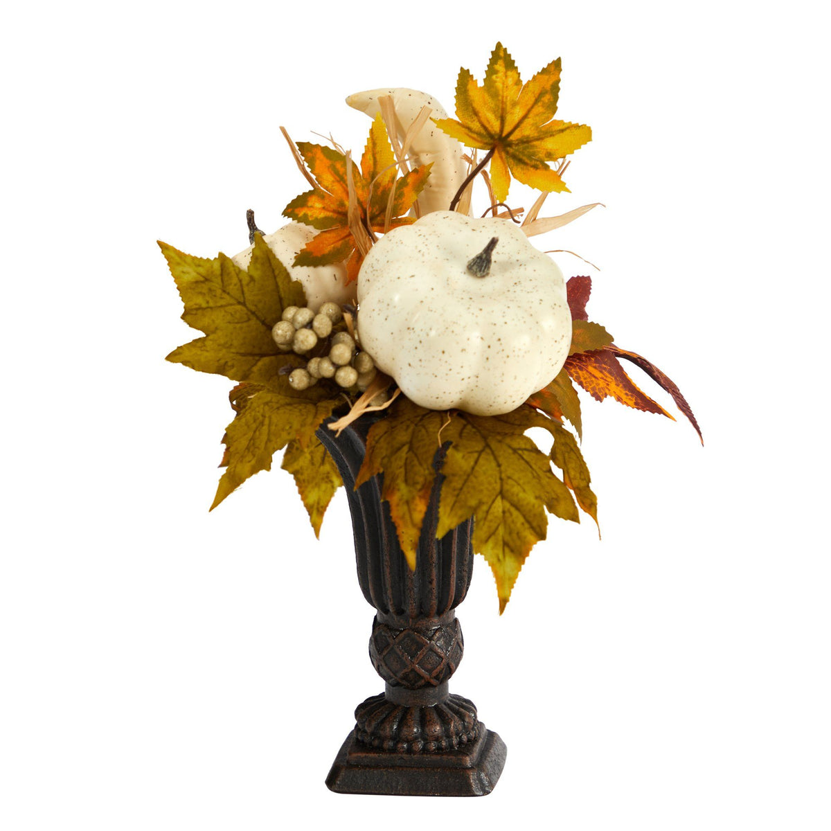 a vase with leaves and pumpkins