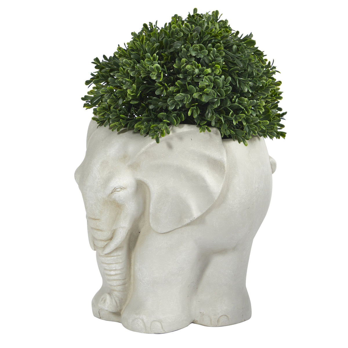 a white elephant planter with a plant in it