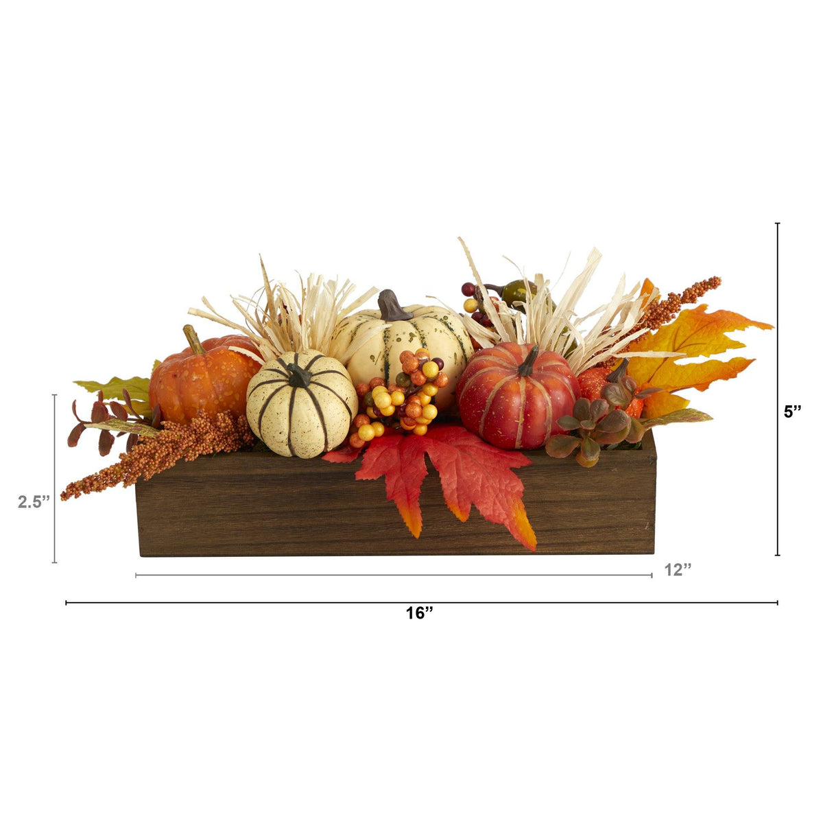 a small pumpkins and leaves in a wooden box