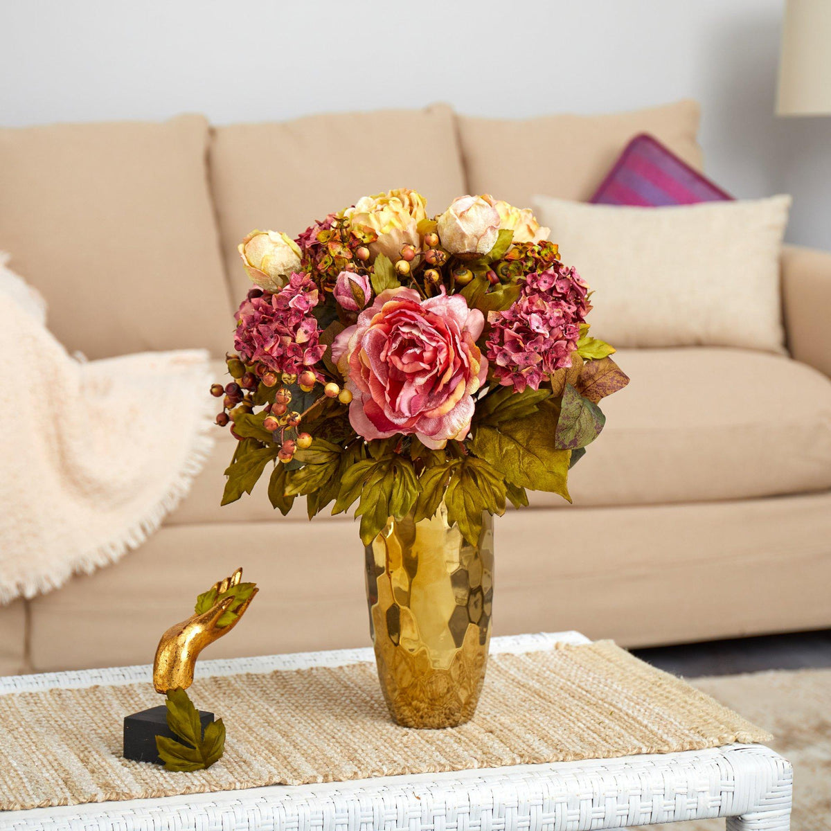 a vase of flowers on a table
