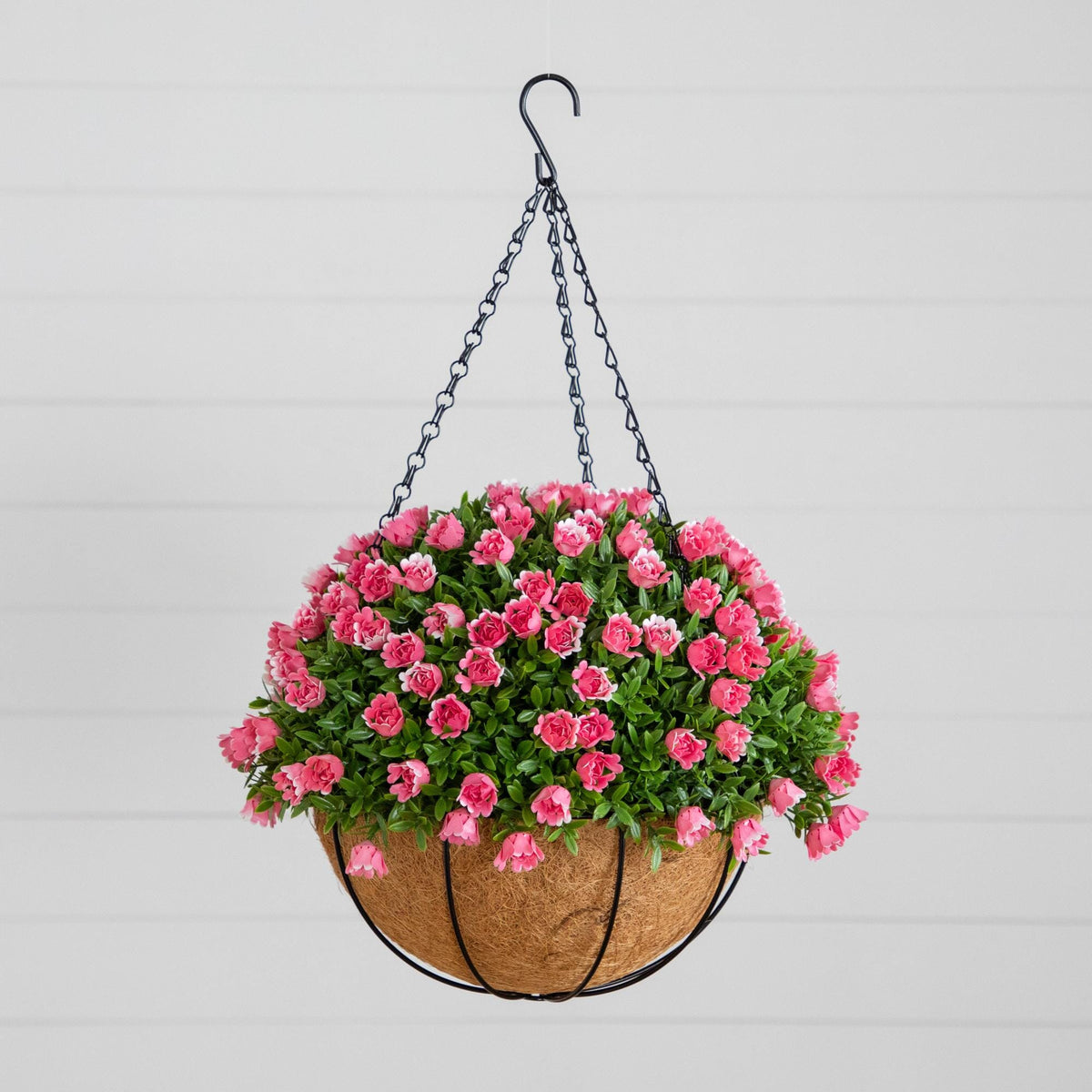 a basket of pink flowers