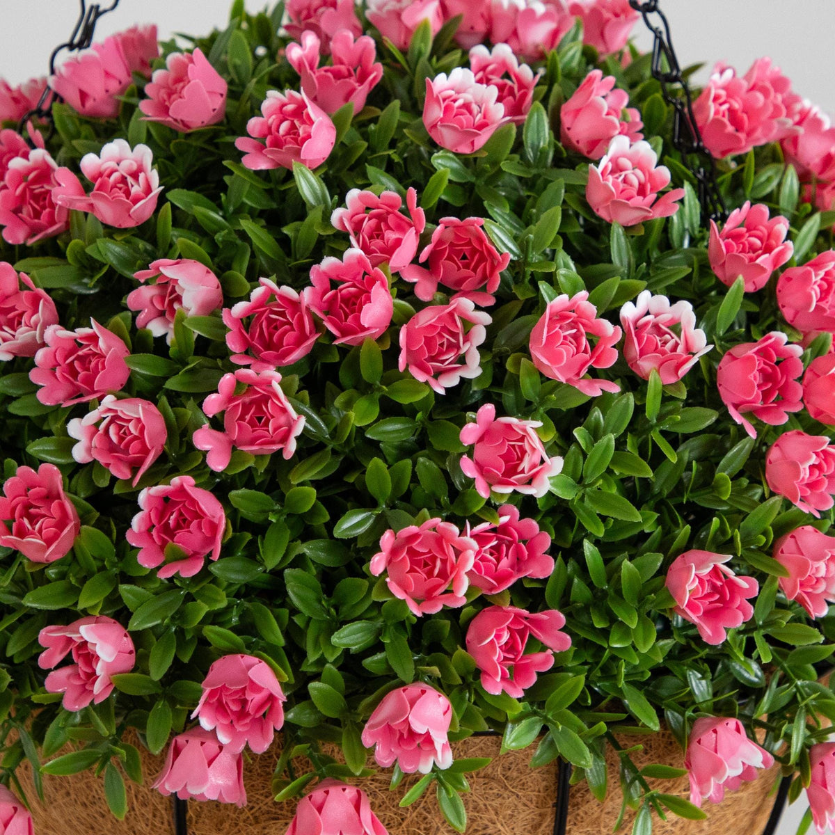 a basket of pink flowers