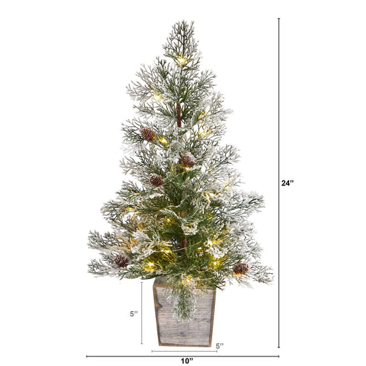a tall artificial christmas tree with lights