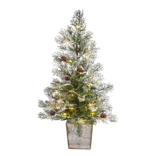 a artificial christmas tree in a pot