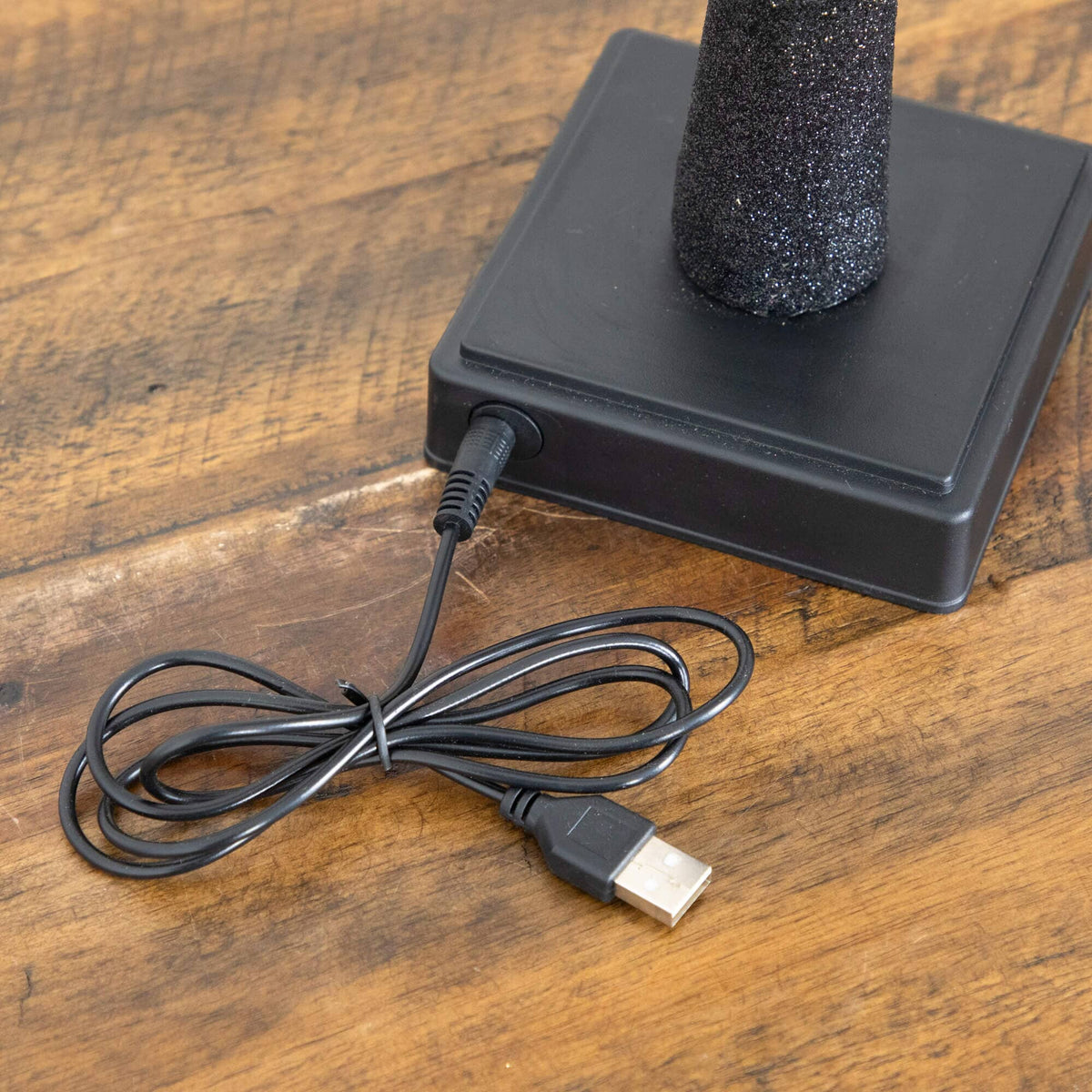 a black object with a black cord