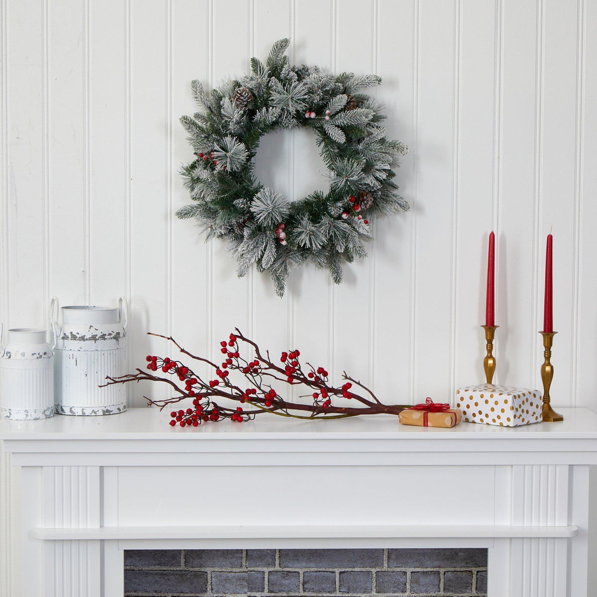 a wreath on a fireplace