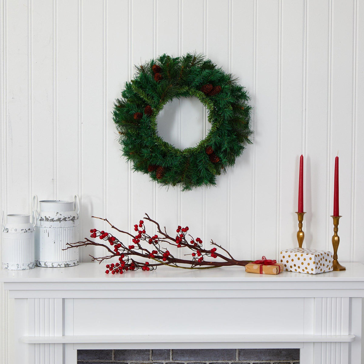 a wreath on a fireplace