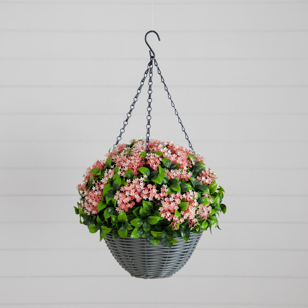 a basket of flowers from a hook