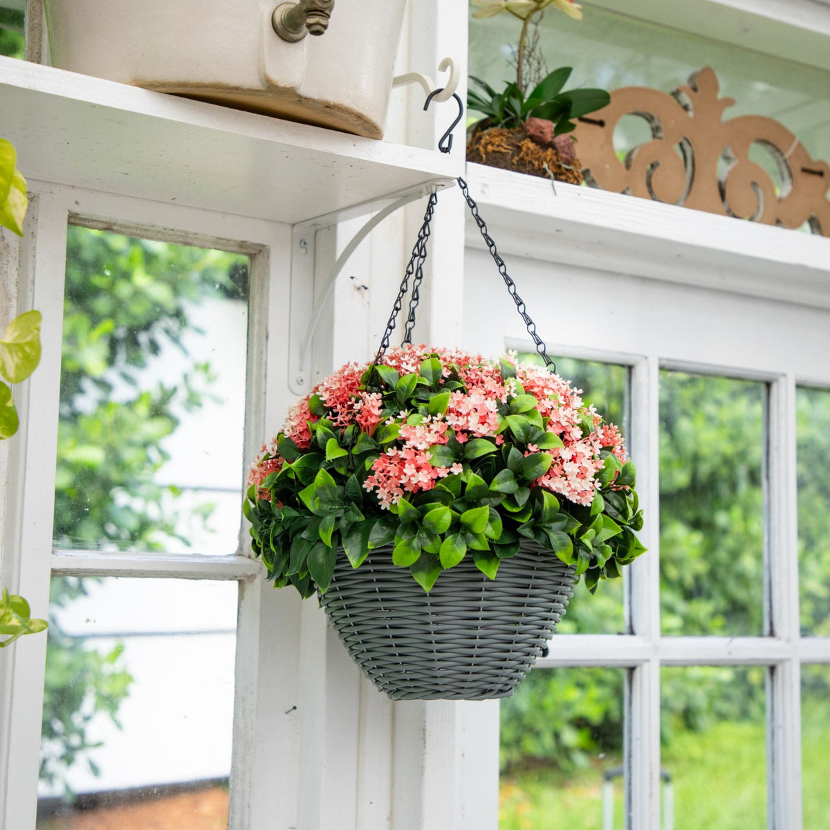 a basket of flowers from a window