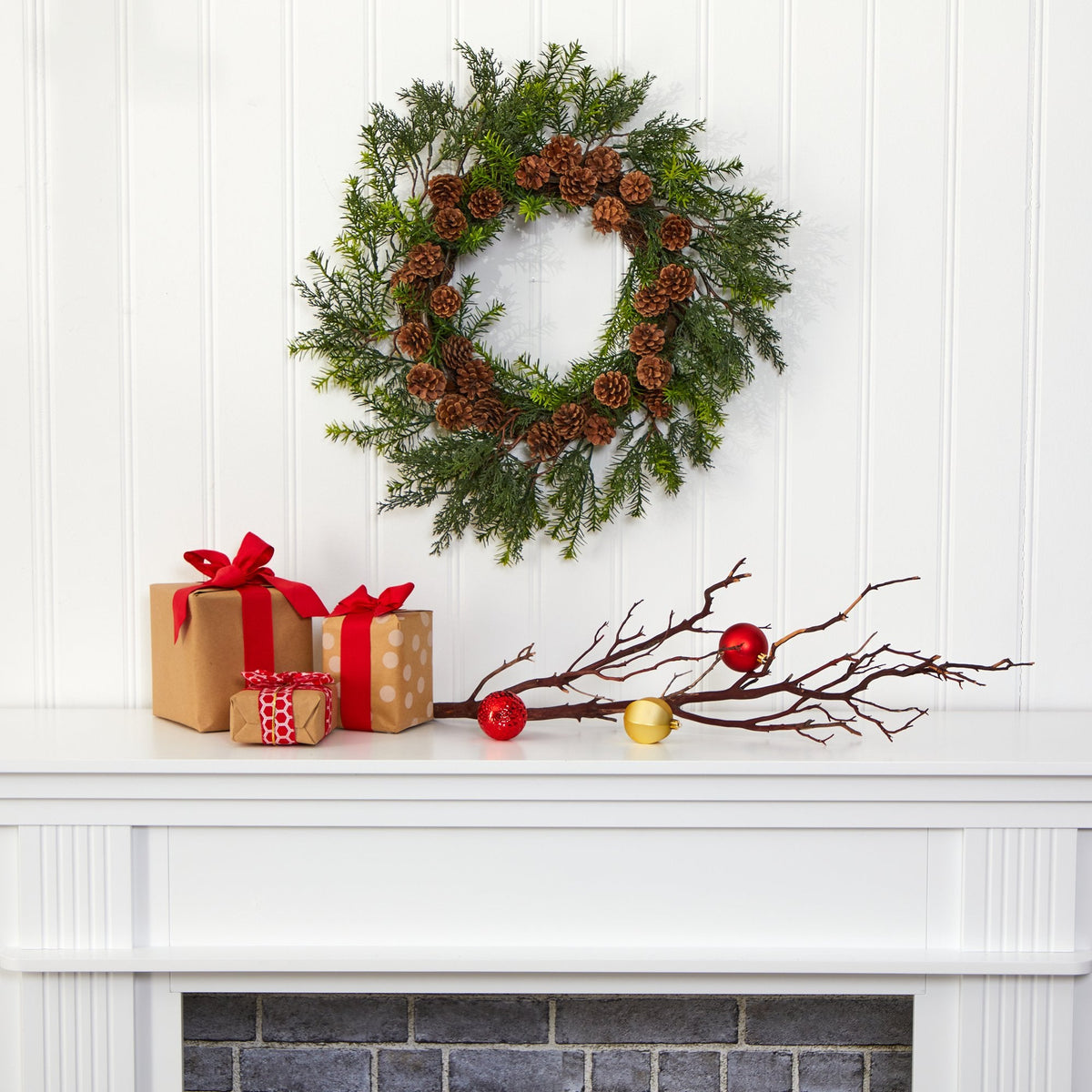a wreath on a fireplace