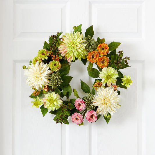 a wreath of flowers on a door