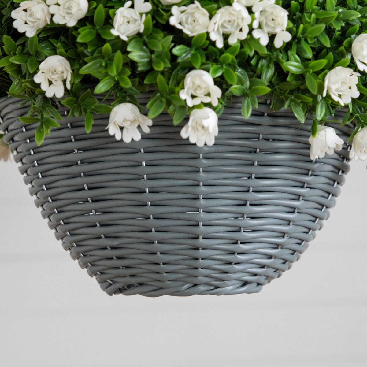 a basket with white flowers