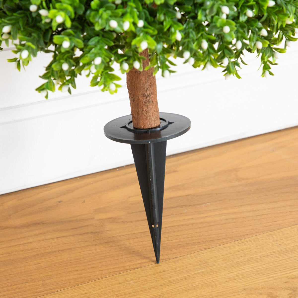 a plant with a metal tip