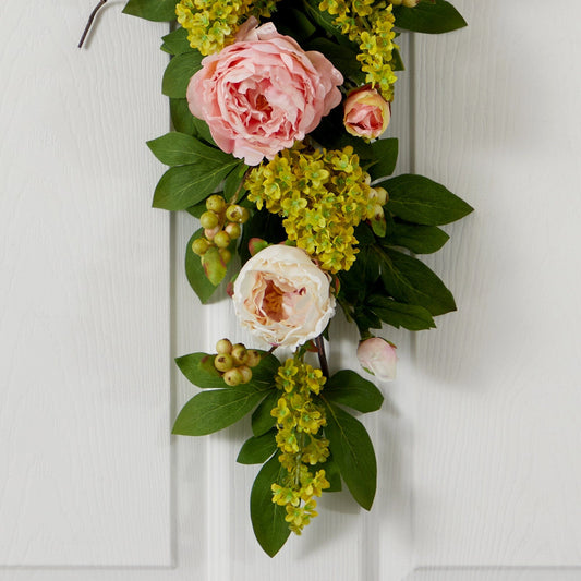 a flower arrangement on a door