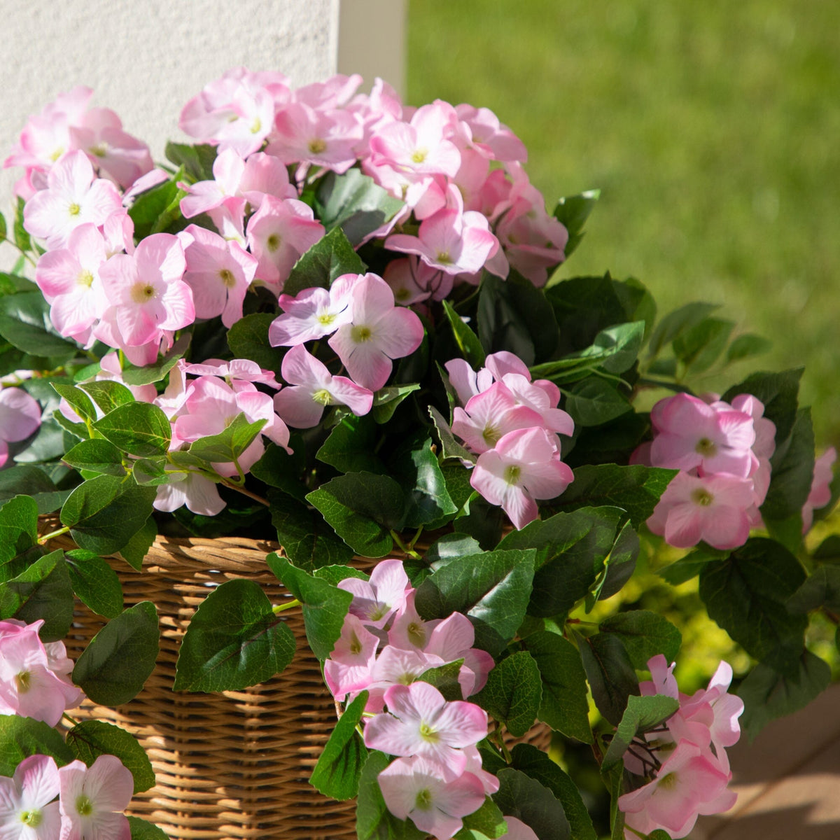 a basket of pink flowers
