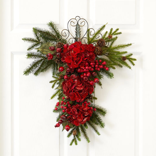 a christmas wreath on a door