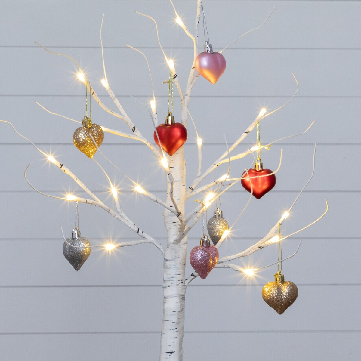 a tree with lights and ornaments