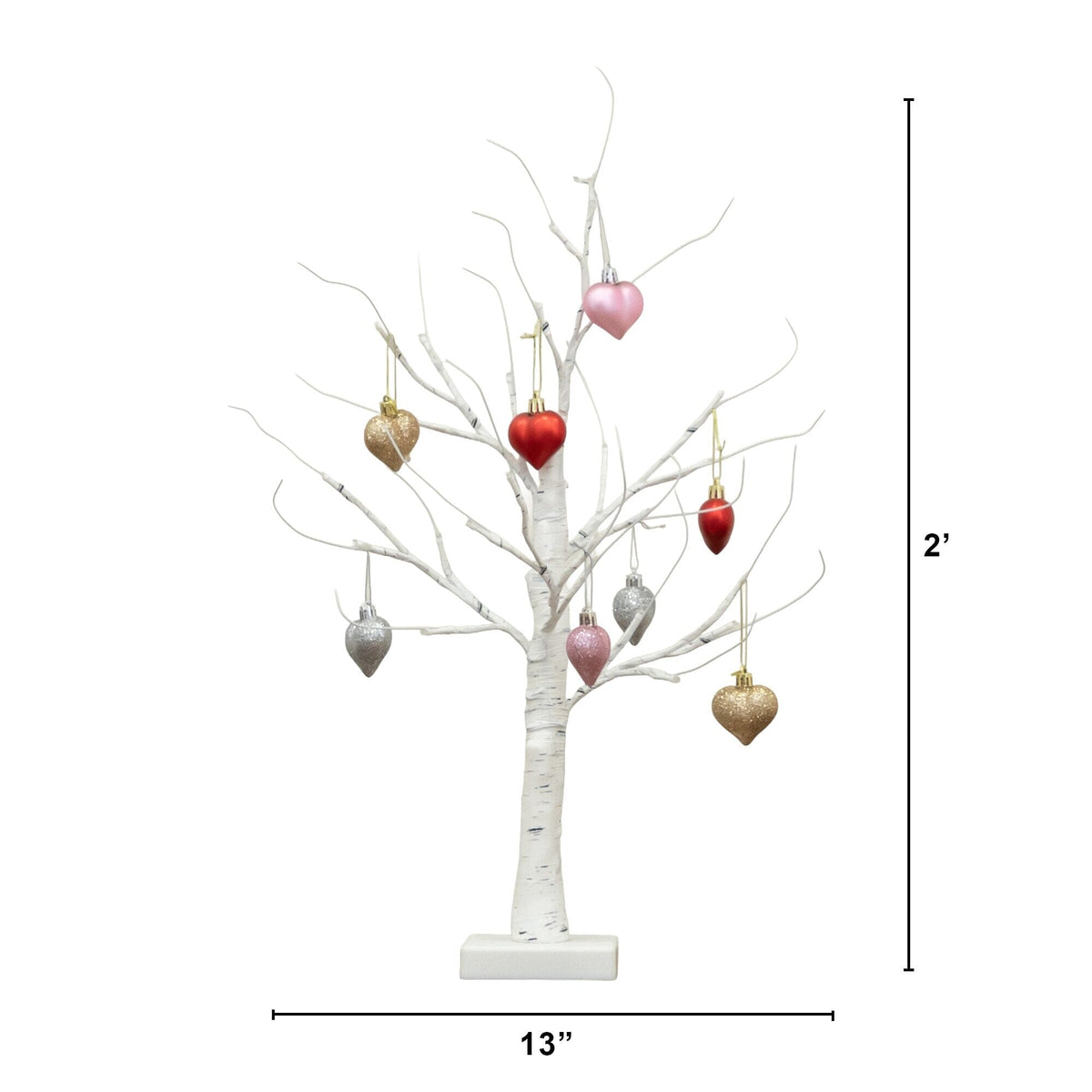a tree with a small heart shaped ornament