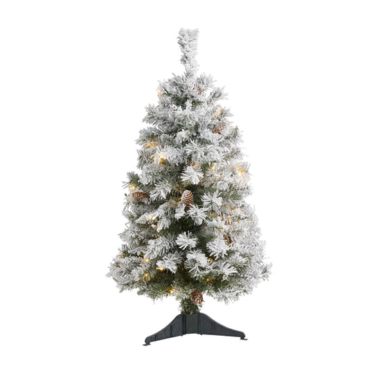 a christmas tree with snow on it