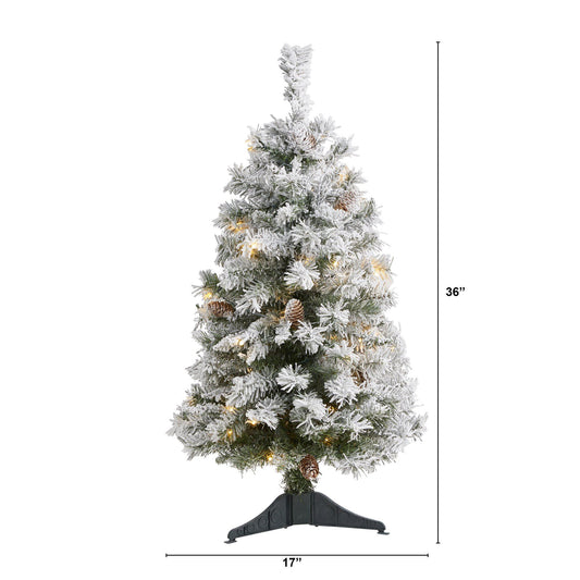 a christmas tree with lights and pine cones