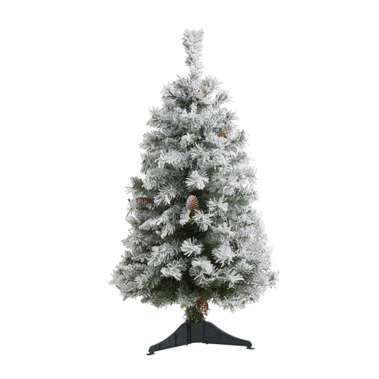 a christmas tree with snow on it