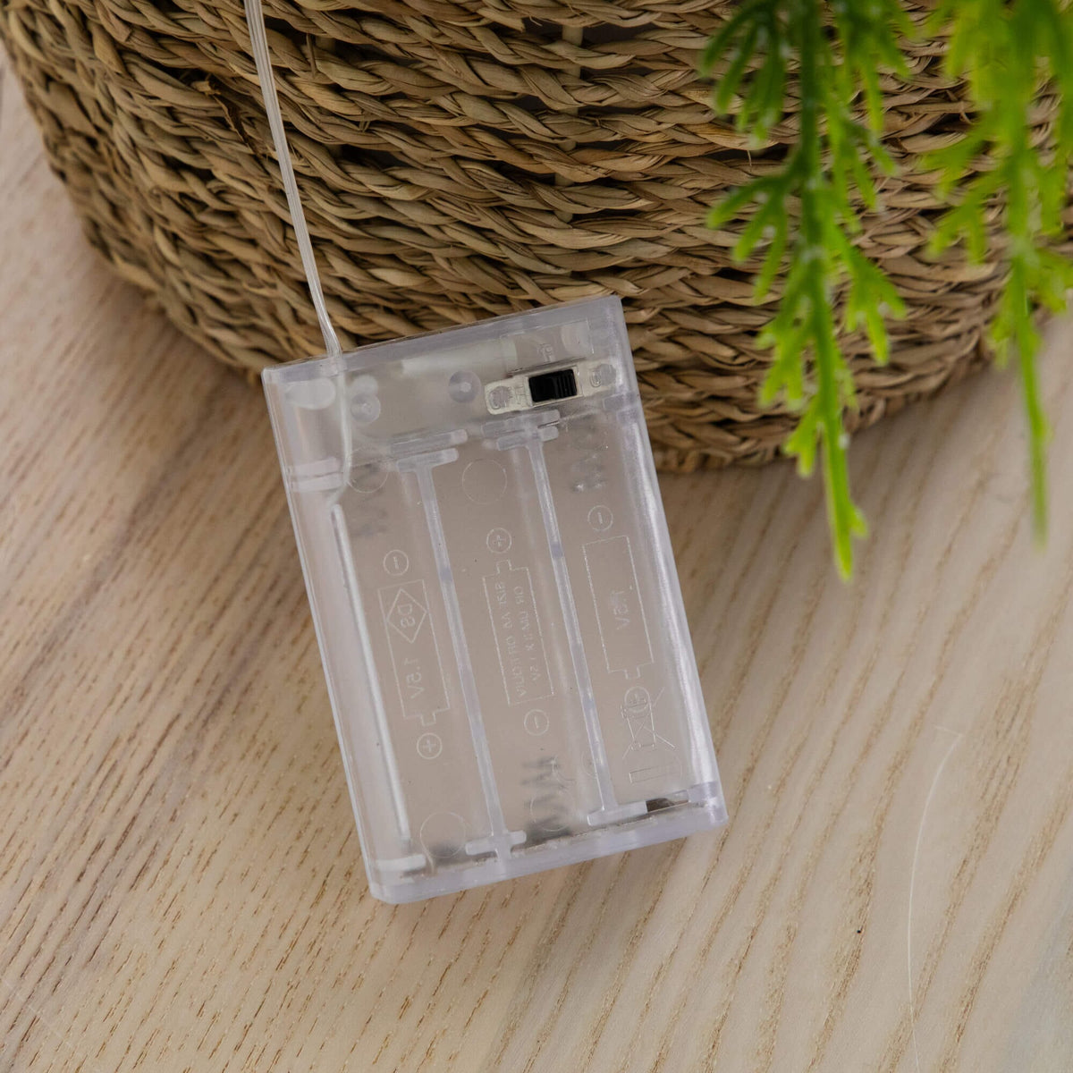 a plastic object on a string