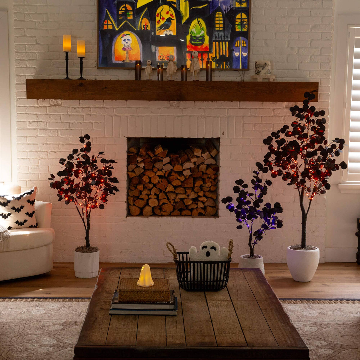 a room with a fireplace and a painting