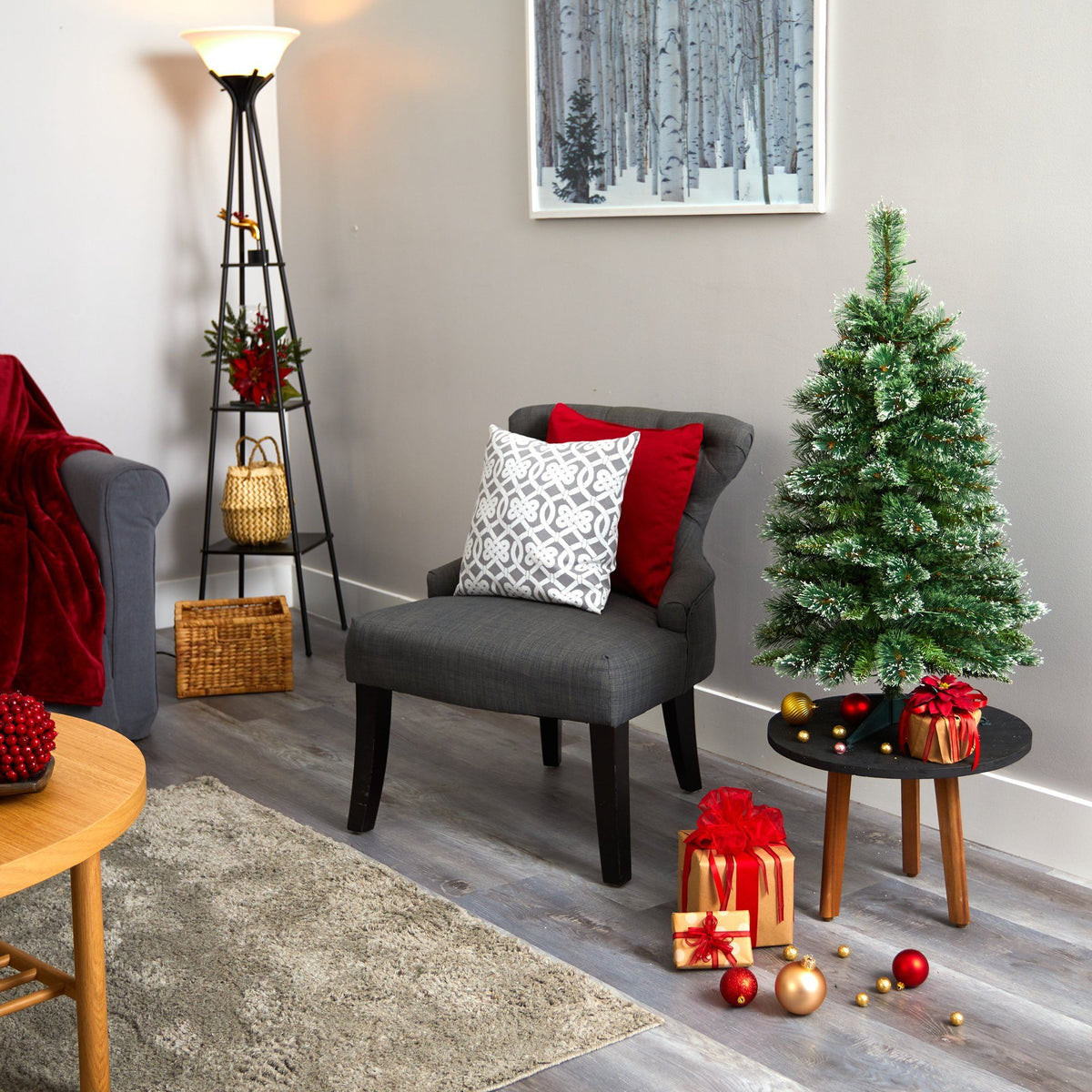 a christmas tree and a chair in a room