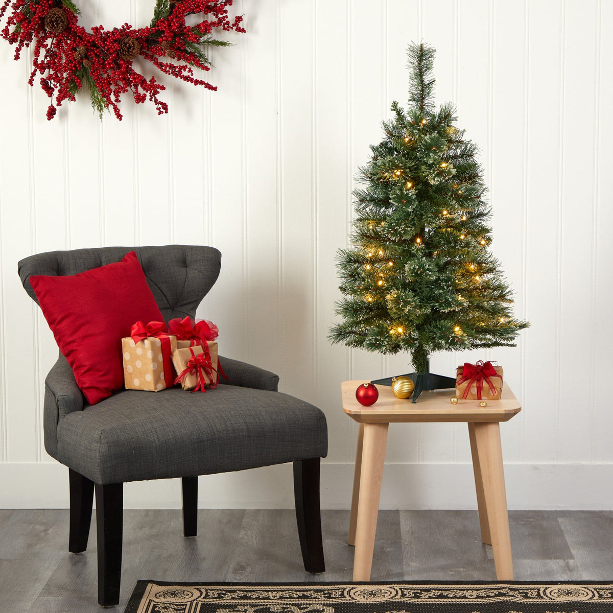 a christmas tree and a chair