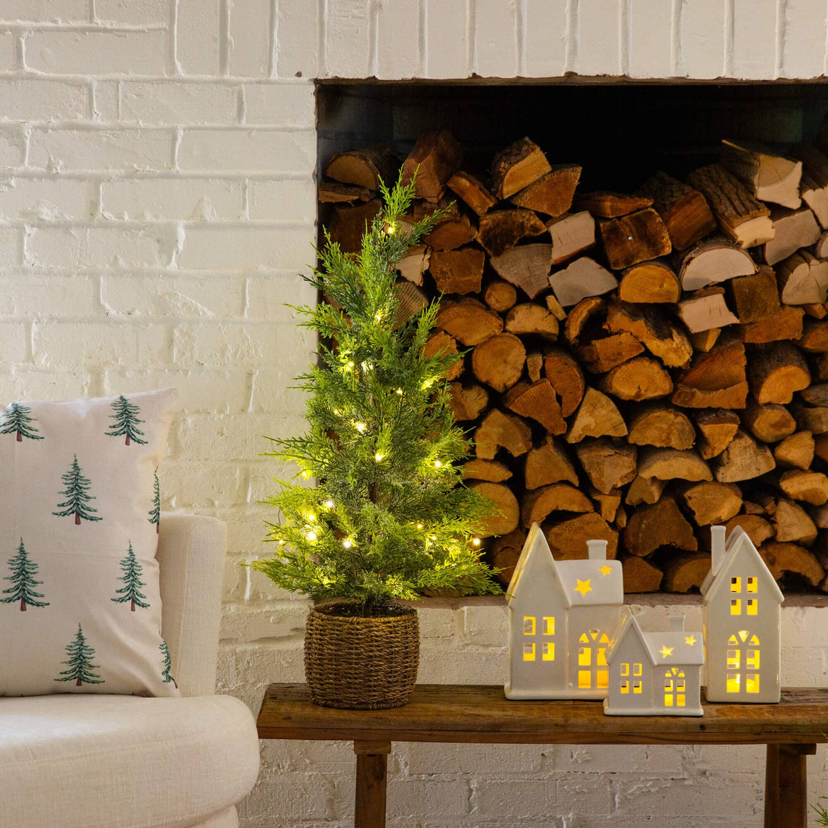 a tree next to a fireplace