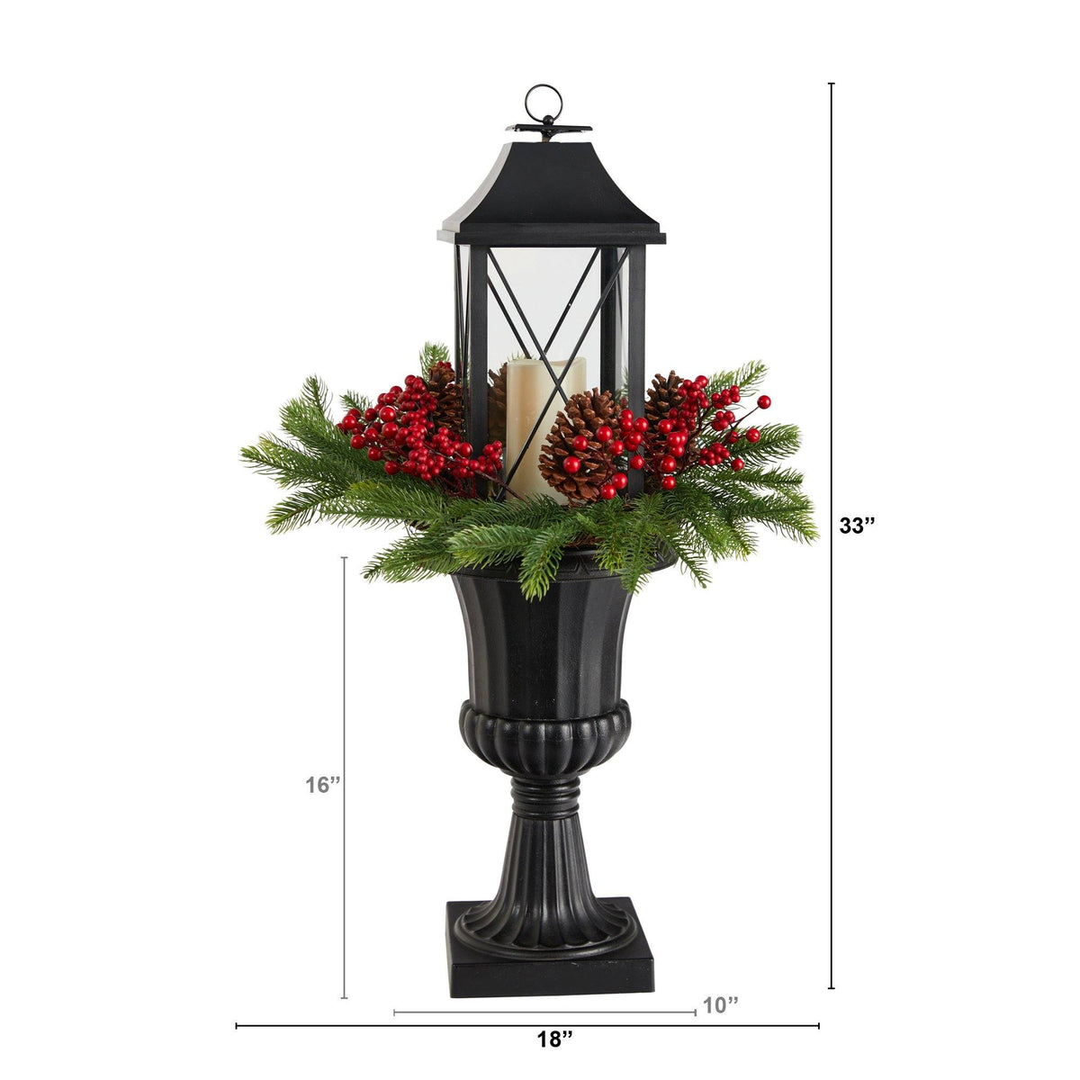 a black lantern with red berries and pine cones