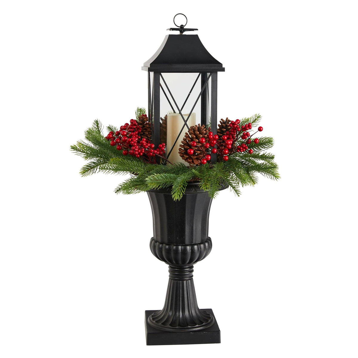 a black lantern with red berries and pine cones in a black vase