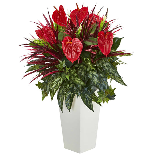 a plant in a white pot