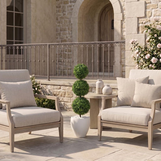 a patio with chairs and a table