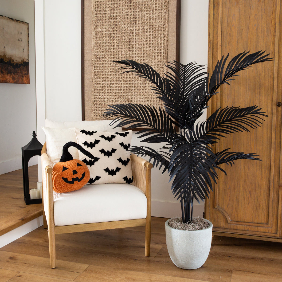 a chair with a plant in front of it