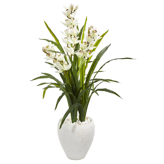 a white plant in a white pot