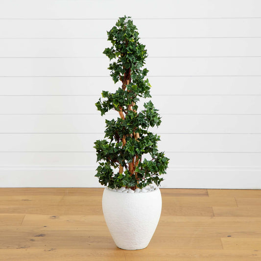 a plant in a white pot