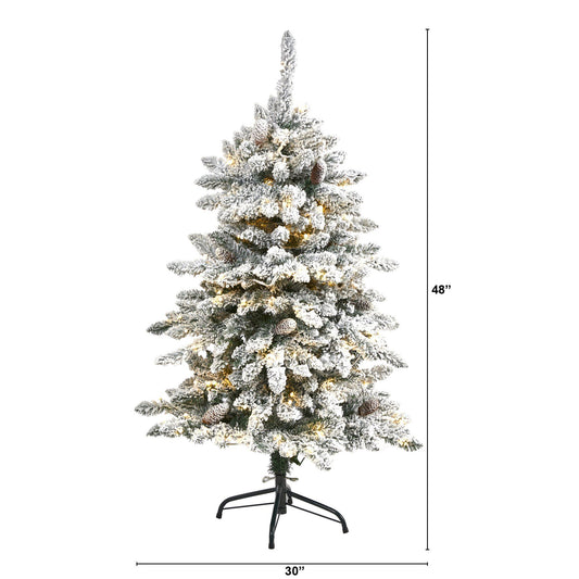 a tall christmas tree with lights