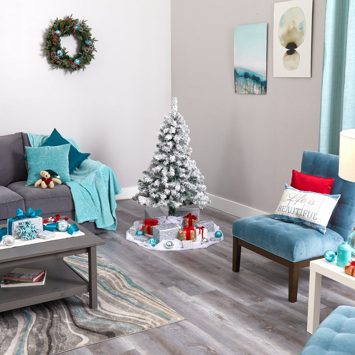 a living room with a christmas tree and a couch