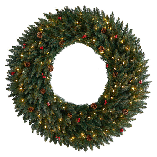 a wreath with lights and pine cones