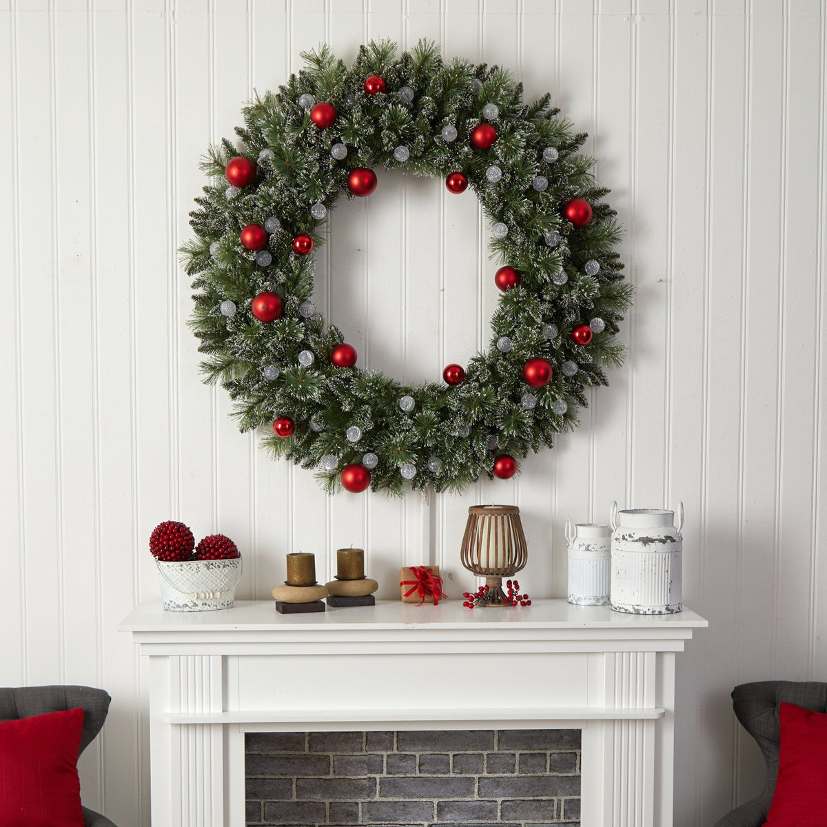 a wreath on a fireplace