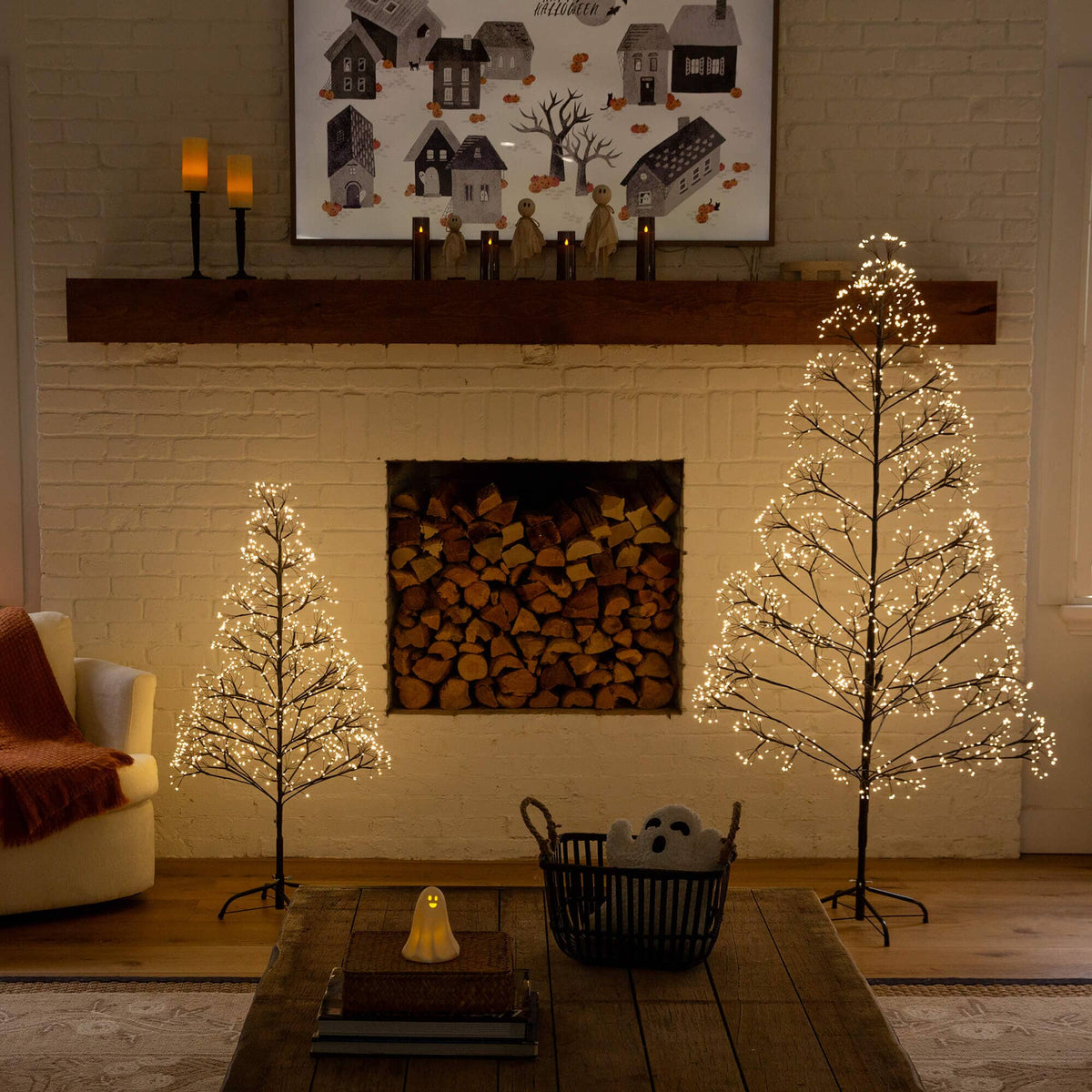 a room with a fireplace and two trees