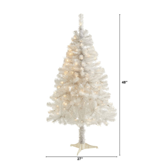 a white christmas tree with lights