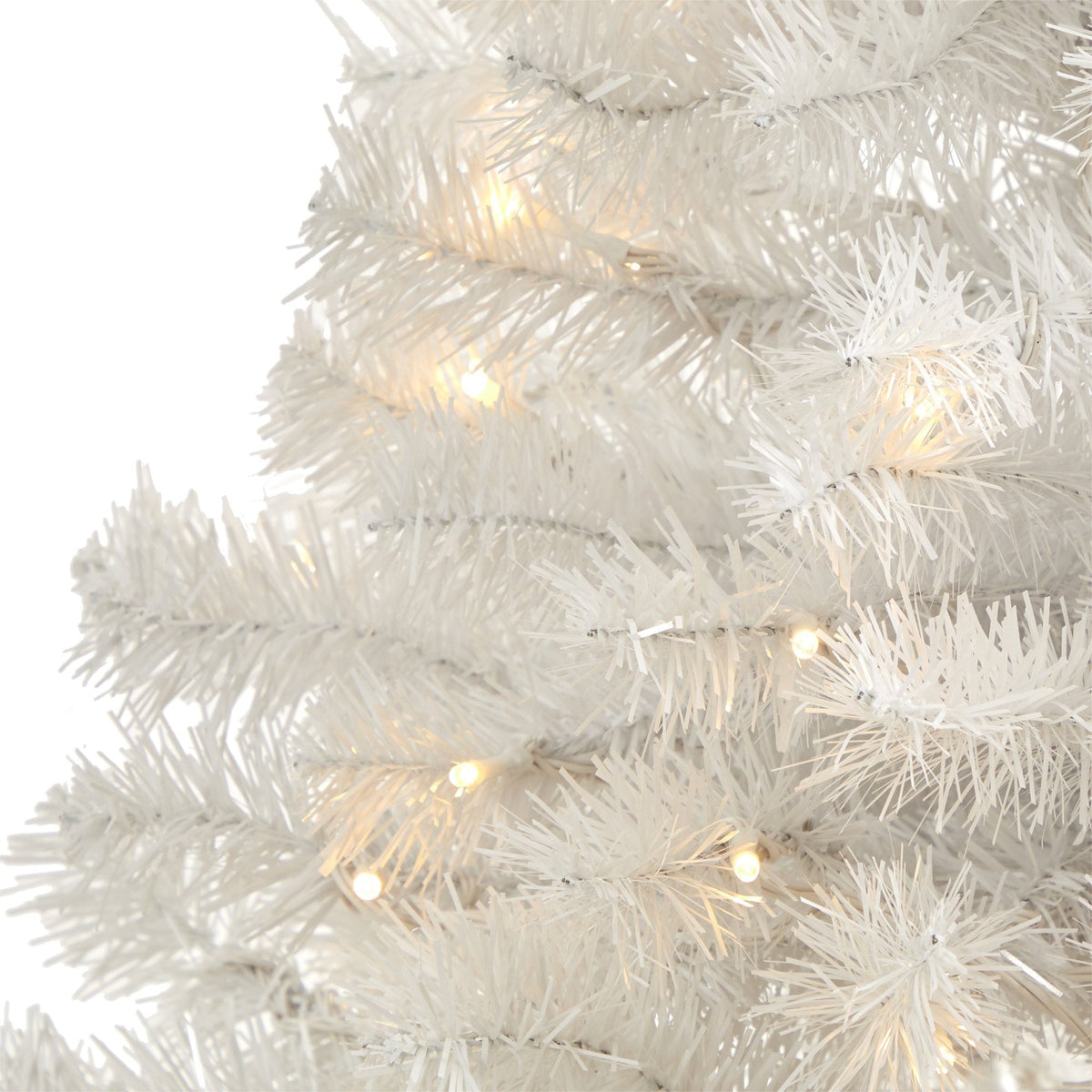 a white tree with lights