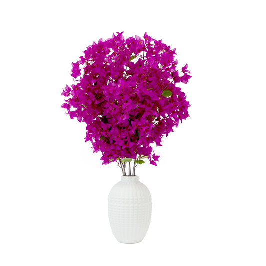 a vase with purple flowers