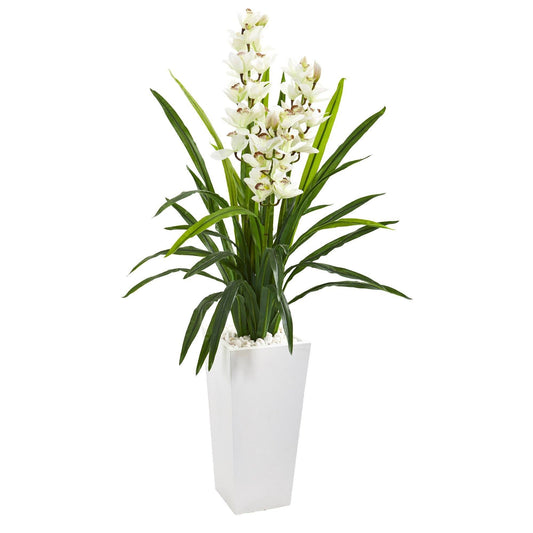 a plant in a white pot
